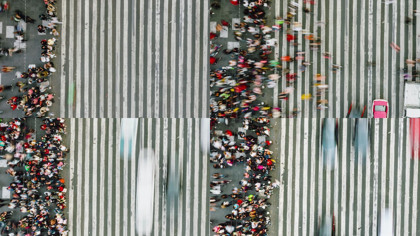 行人在拥挤的交通中穿行的延时鸟瞰图。