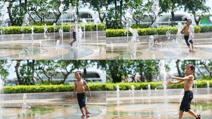 孩子通过喷泉的慢动作