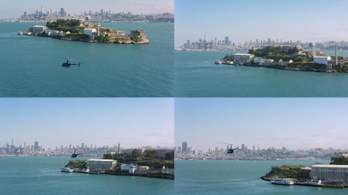 以旧金山为背景的空中直升机在恶魔岛飞行