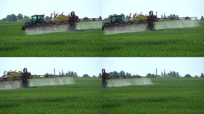 农用拖拉机为麦田喷除草剂杀虫剂