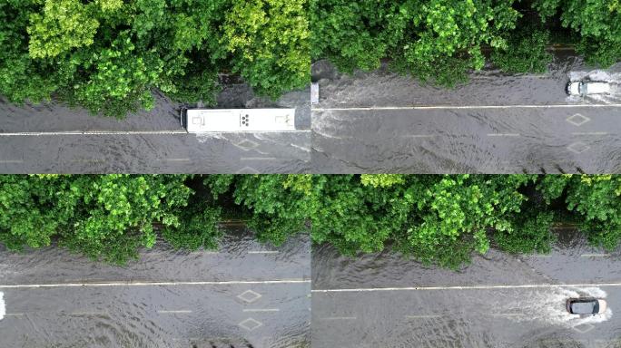 航拍车辆驶过积水雨水的道路街道冲浪