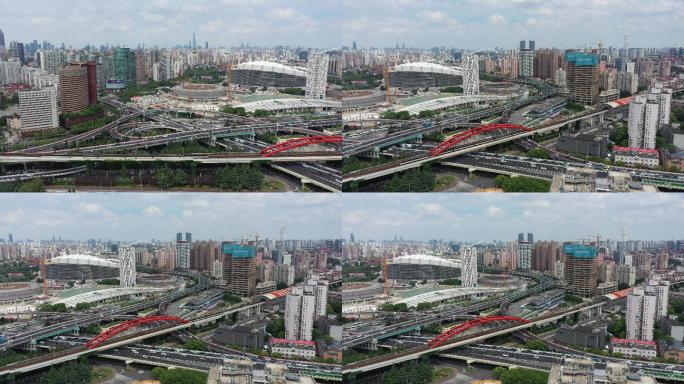 4K航拍上海体育馆繁华都市交通高架地铁