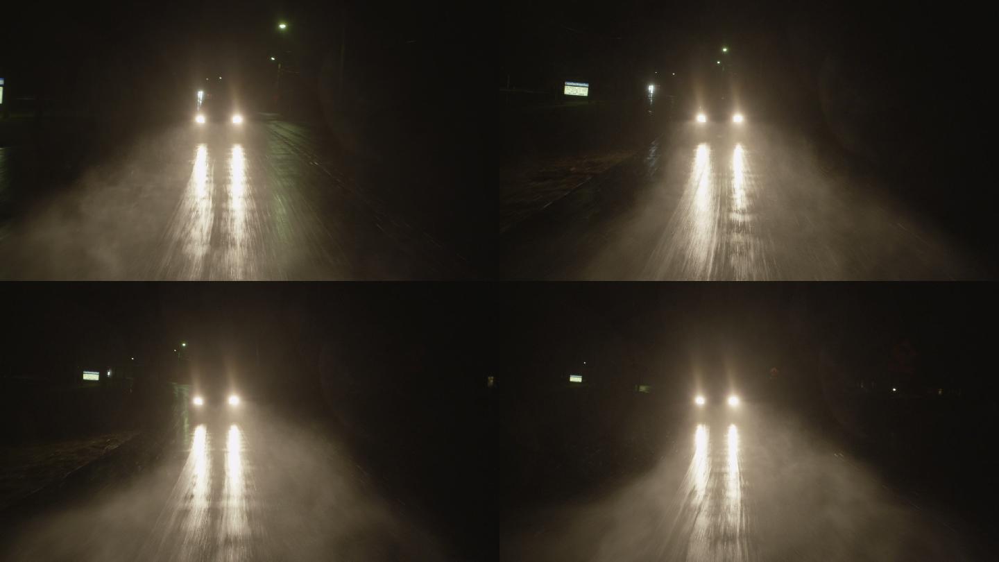 雨夜汽车行走在公路上