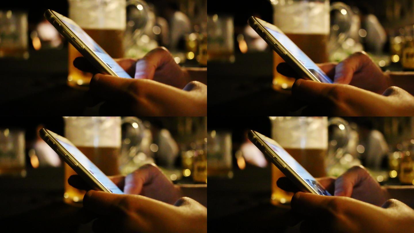 女人在酒吧使用智能手机
