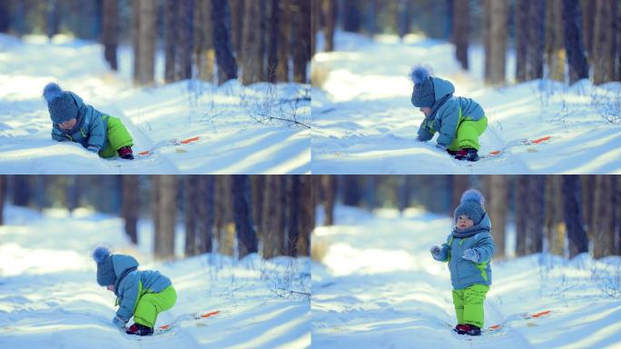 孩子在雪堆里玩耍