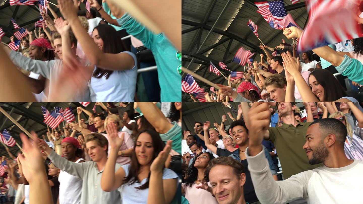 体育场内观众手持美国国旗欢呼