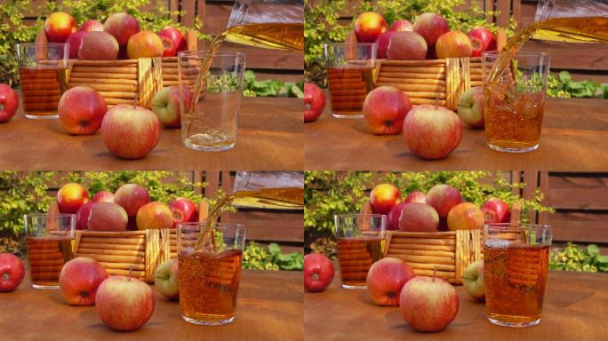 木桌上放着苹果汁和一篮熟苹果