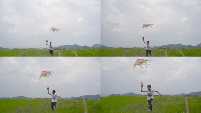 男孩放风筝，追逐梦想。