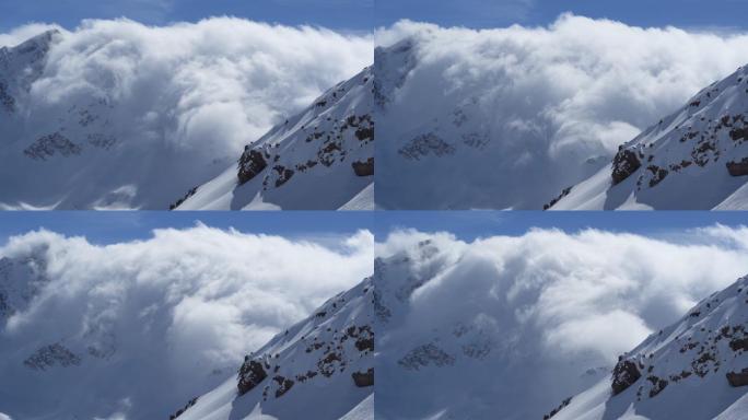 山脉山腰上翻滚的云层