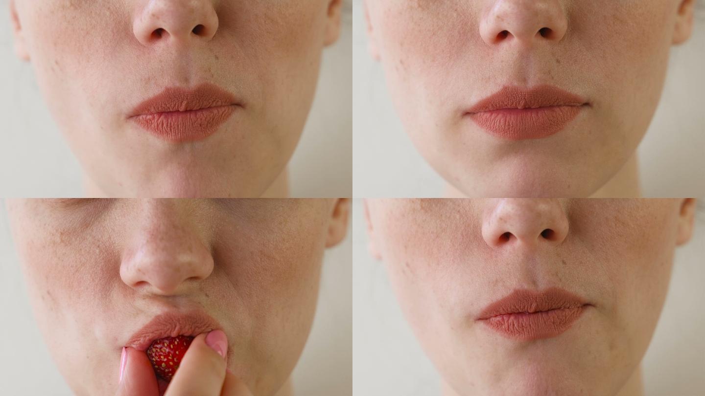 女人吃草莓的嘴巴特写