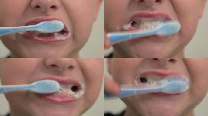 小男孩用牙刷刷牙