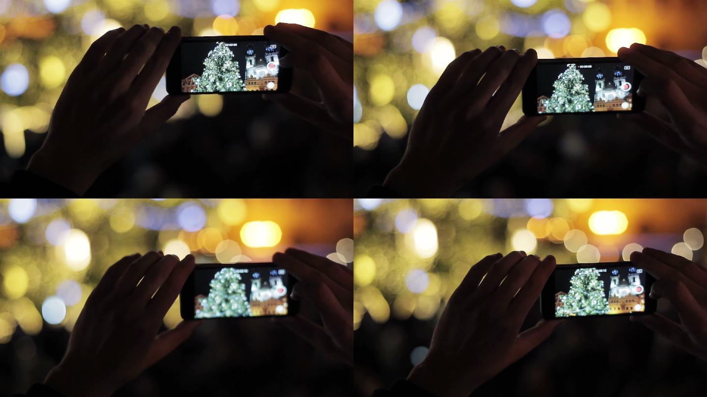 使用智能手机拍摄传统圣诞树