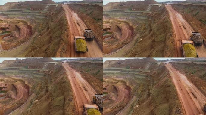 两辆卡车从采石场运载矿石