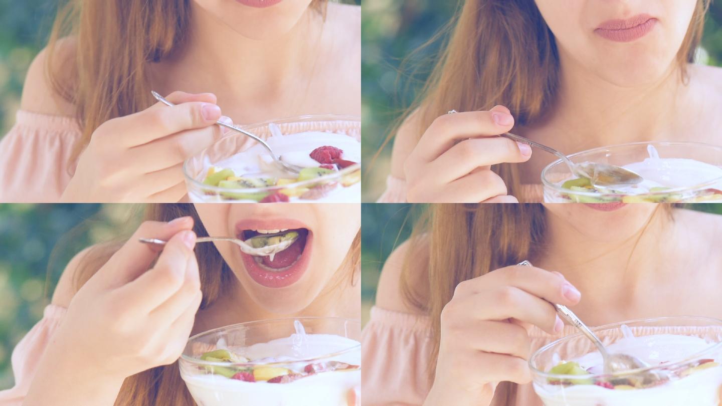 年轻女子吃酸奶.