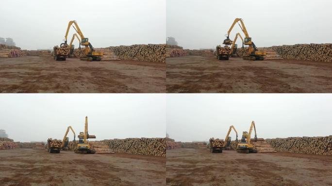 挖掘机卸木头