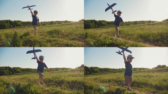 一个孩子手里拿着一架玩具飞机跑步