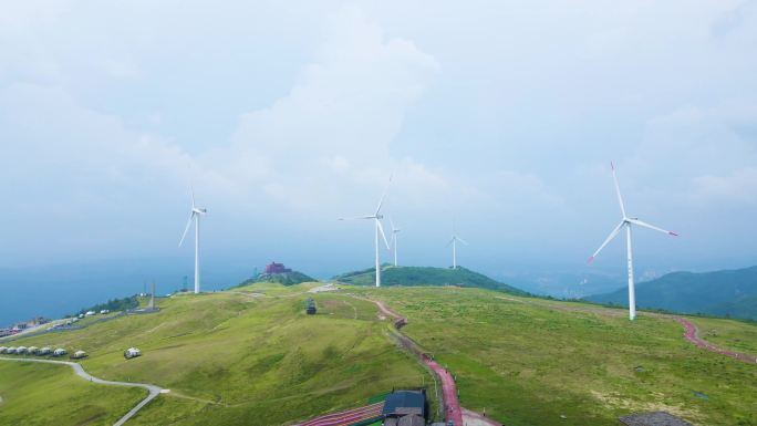 航拍大气山顶风力发电风车视频素材