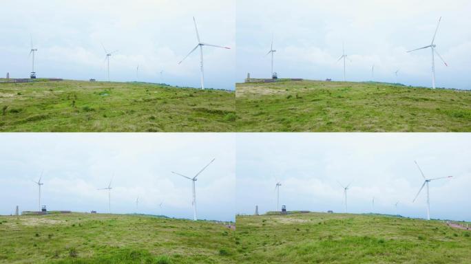 大气航拍草原山顶风车发电基地生态发展风能