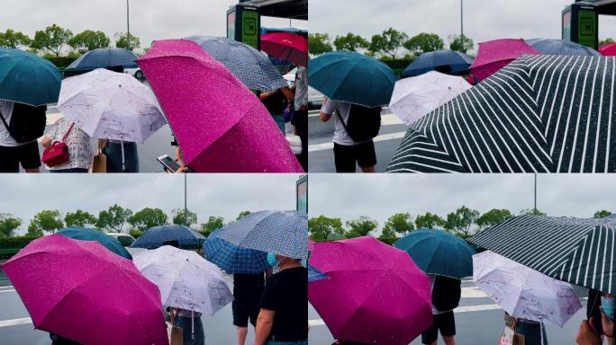 下雨打伞等待公交4K实拍单镜头