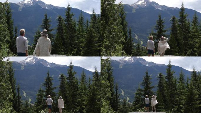 老年夫妇走出去看山坡上的风景