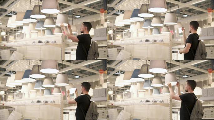 购物者正在检查大型零售店的各种灯罩
