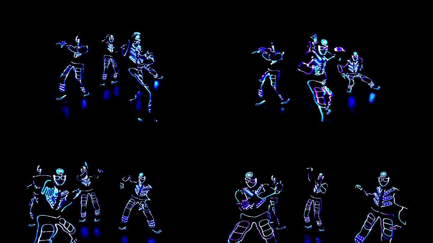 4个人穿着LED的服装跳舞