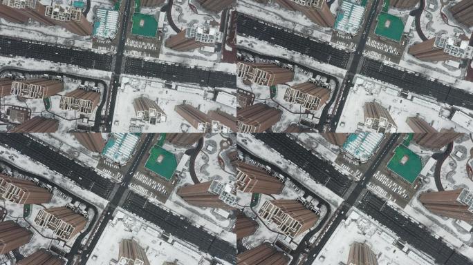 下雪后的住宅4K航拍鸟瞰公路白雪覆盖