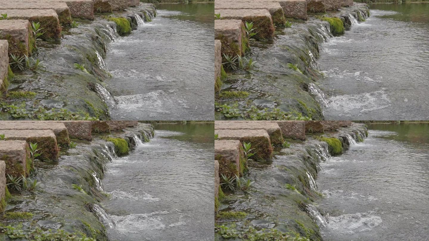 潺潺流水石墩桥自然美景