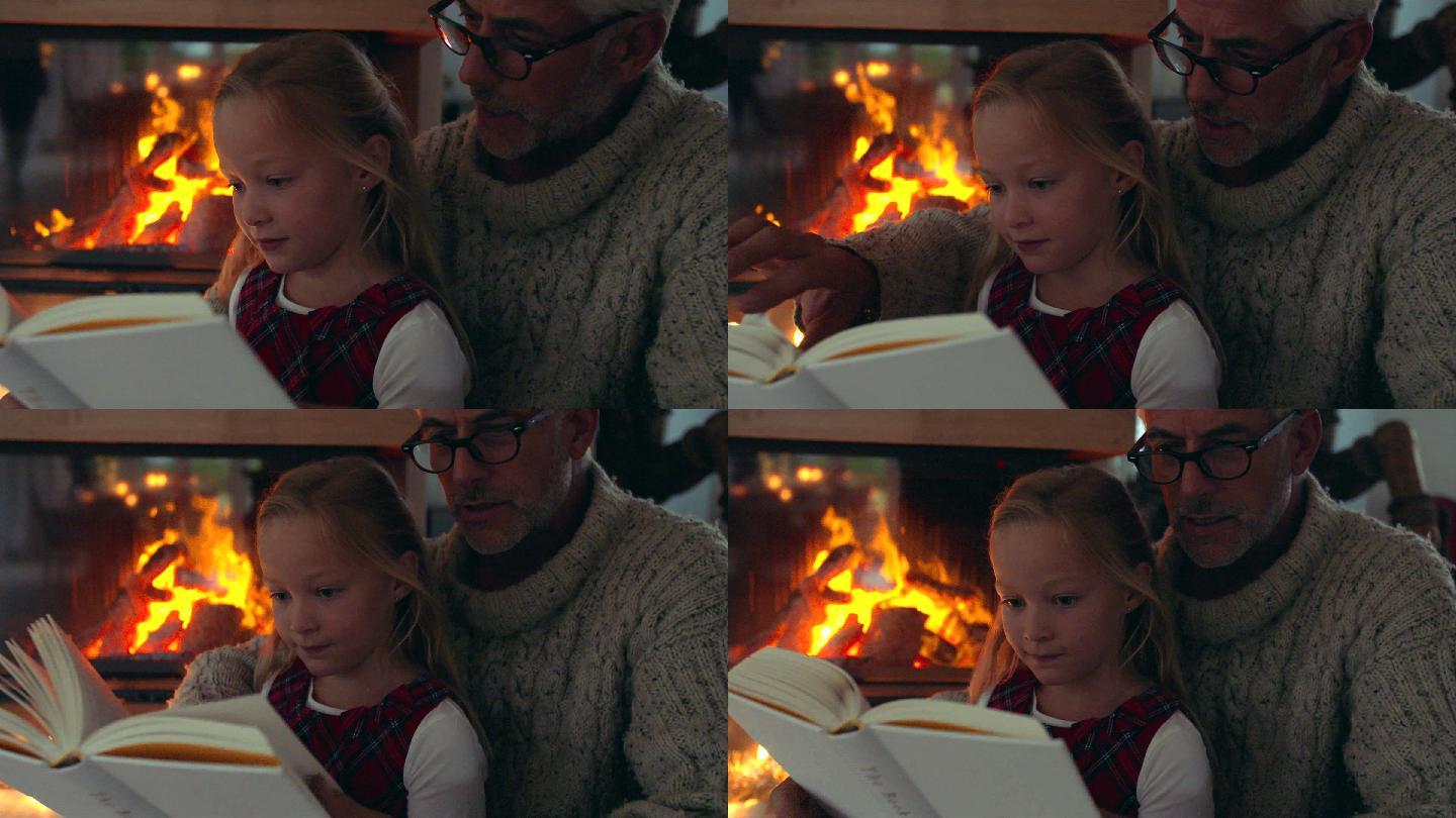 小女孩和爷爷在壁炉旁看书