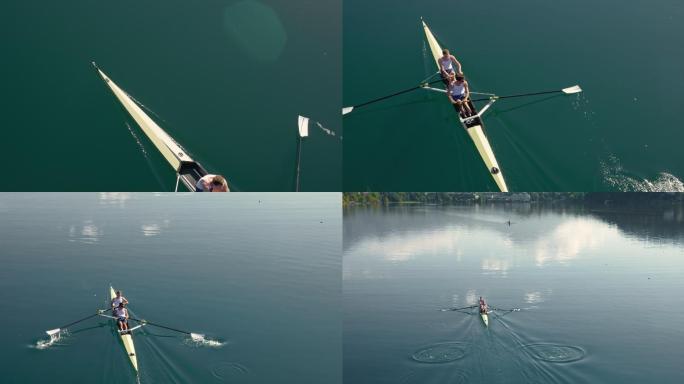 两名运动员组成的划船队在湖面上划船