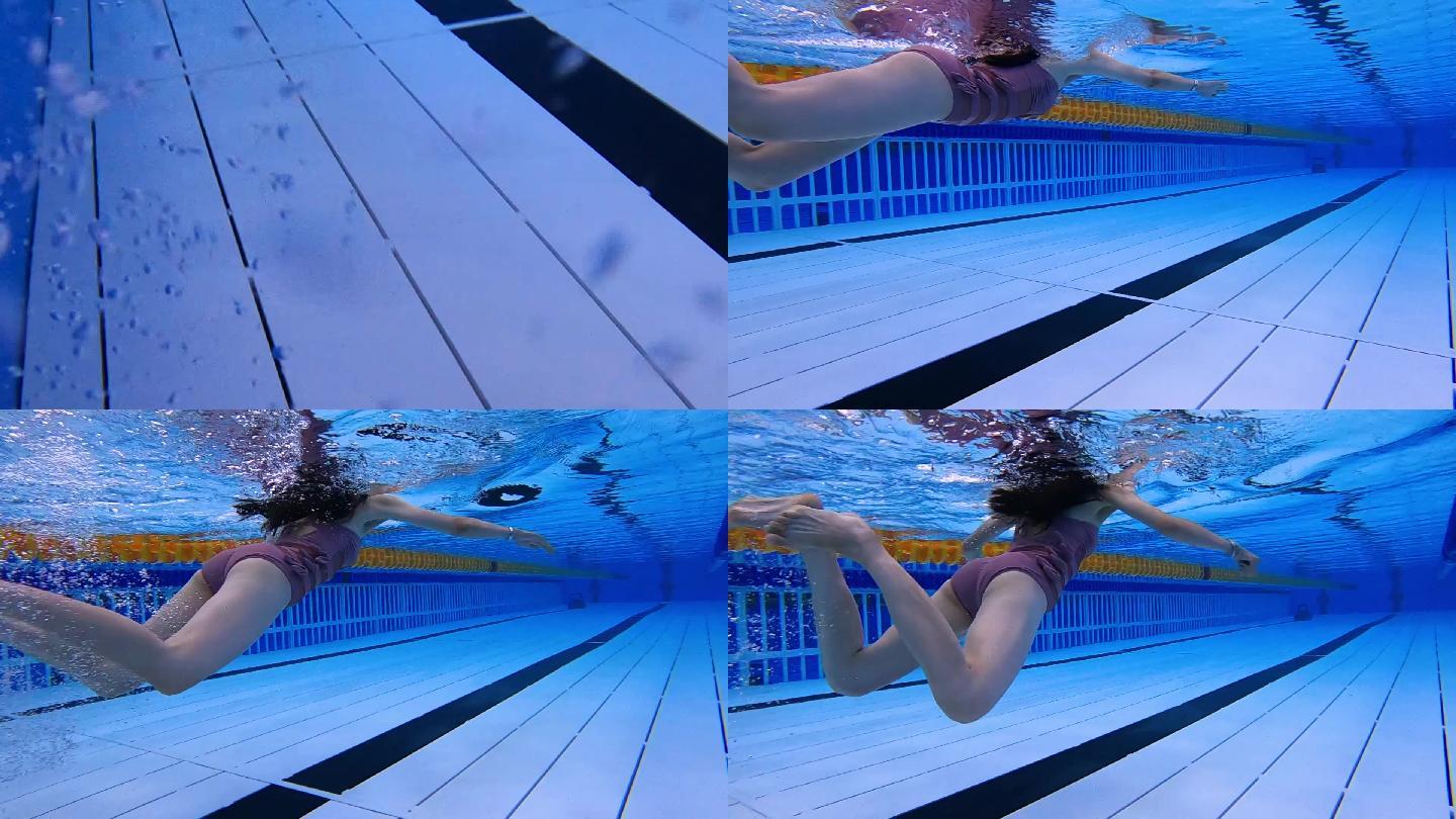 游泳池年轻女孩水面水下拍摄慢动作