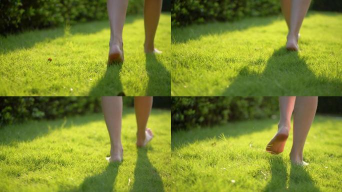 女孩赤脚在草地走路亲近大自然4k视频素材