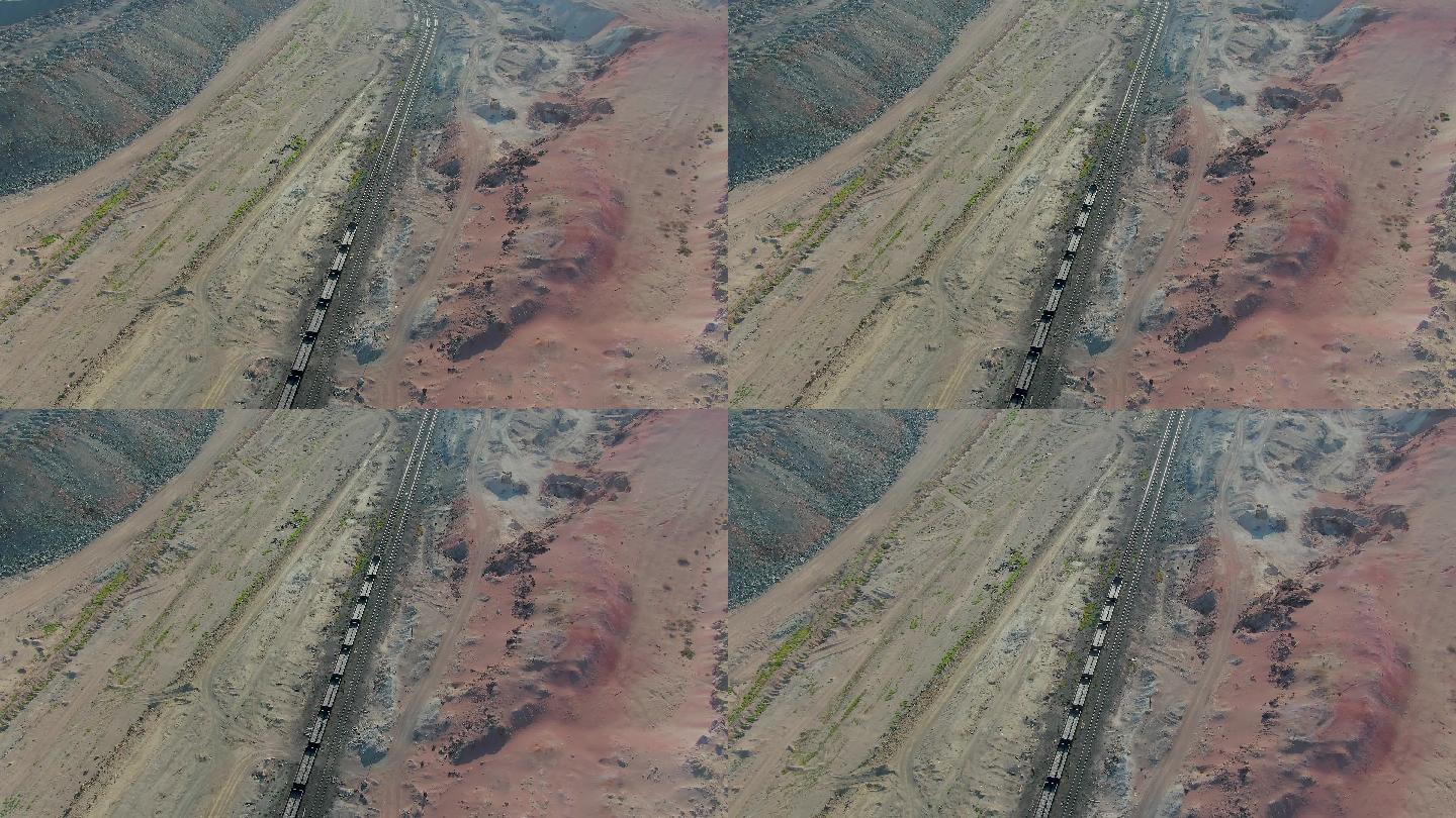 航拍新疆哈密三道岭煤矿蒸汽火车运输挖煤
