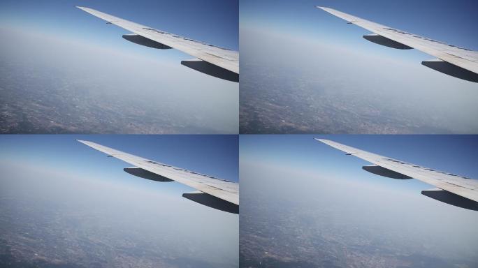 飞机舷窗俯瞰云层 机翼