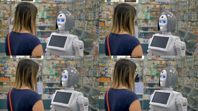 机器人站在药店的中心帮助顾客。