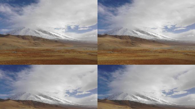 延时拍摄新疆慕士塔格雪山草地
