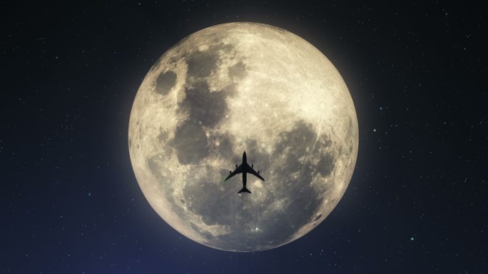 飞越超级月球的飞机轮廓