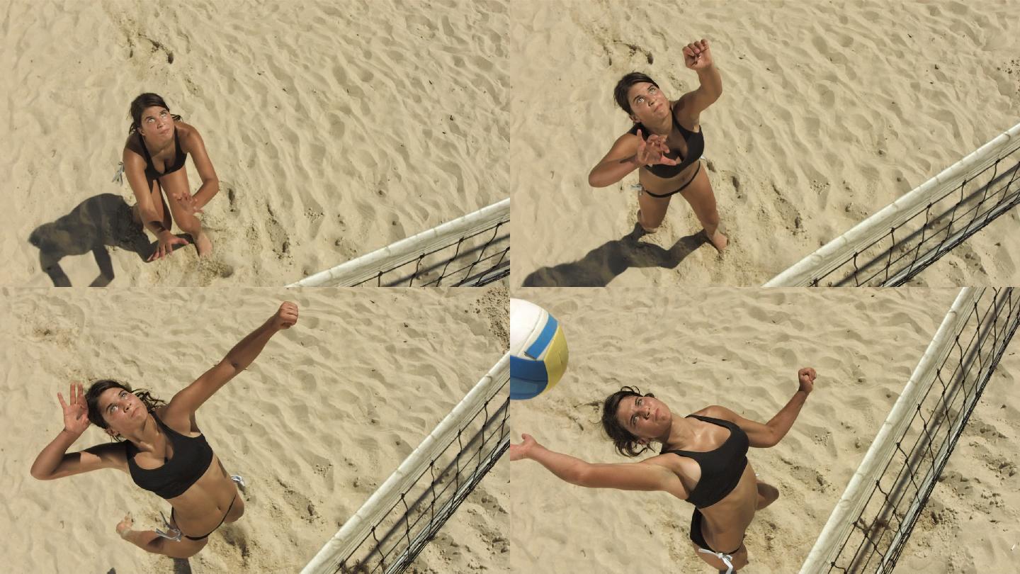 女子沙滩排球运动员发球