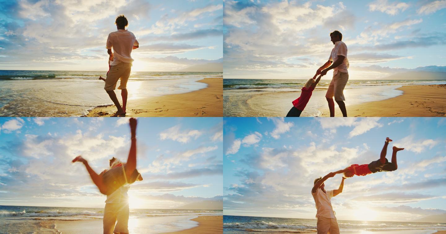 父亲和儿子在日落时在海滩上玩耍