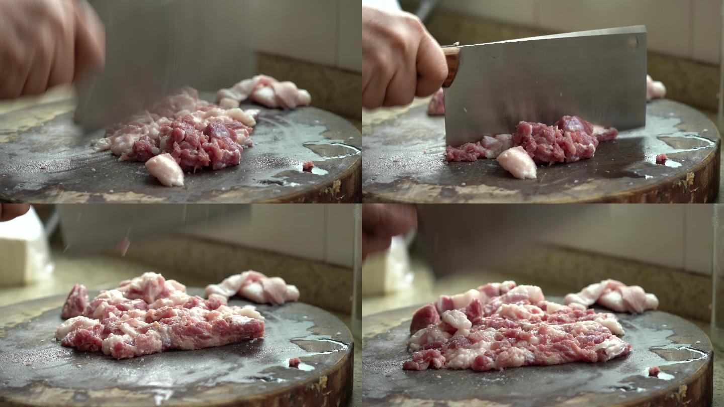 一位中国厨师在砧板上剁猪肉，制作肉末