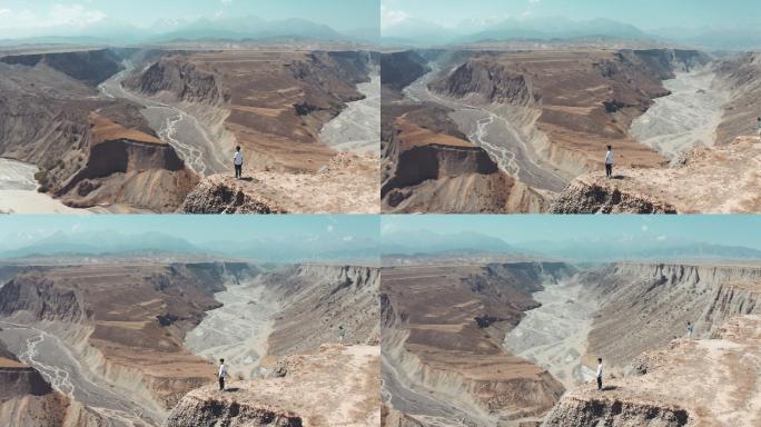 4K新疆安集海大峡谷航拍人物环绕