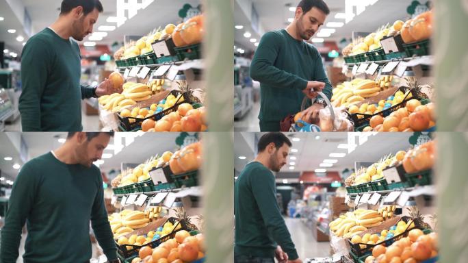 男人在超市买水果。