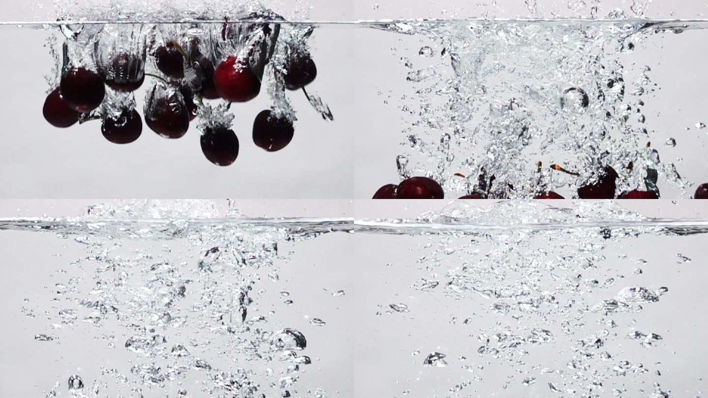 超慢镜头：白色背景下樱桃落入淡水中
