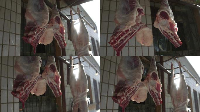 新疆风情新疆农户家门口挂的羊肉羊腿