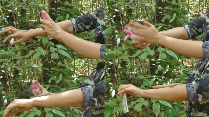 研究人员在热带雨林使用喷雾灭蚊剂