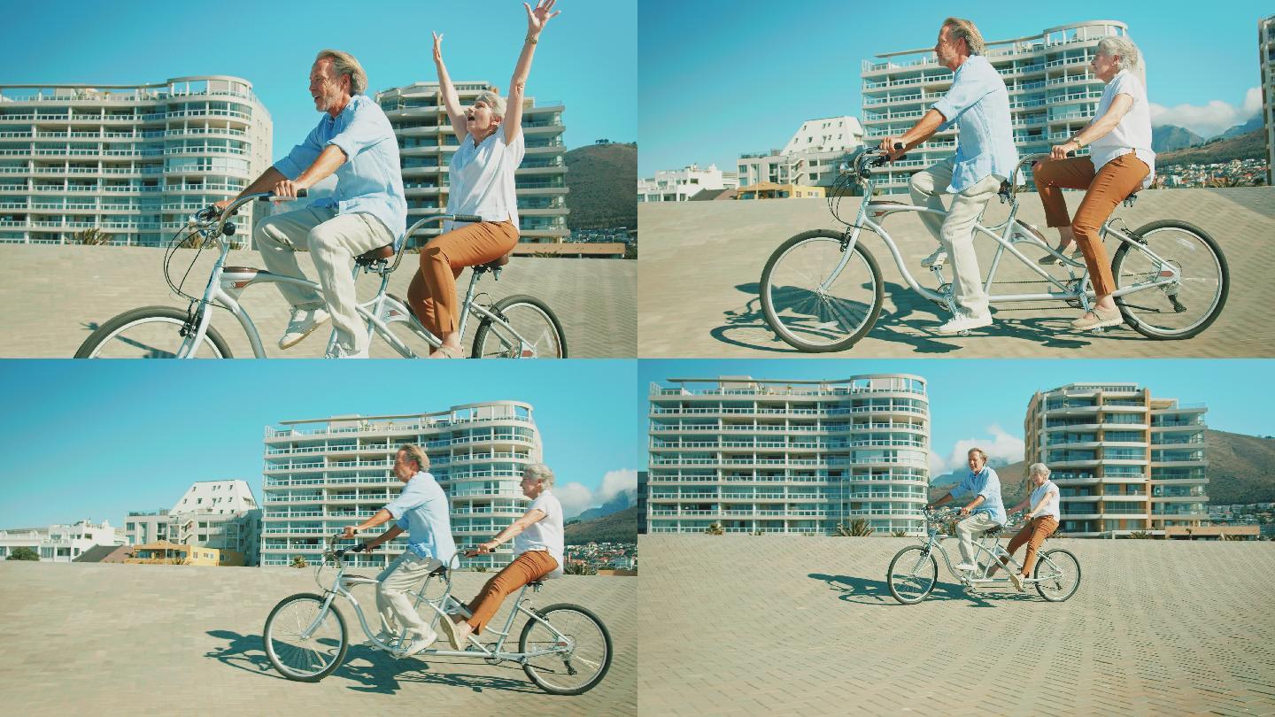 老年夫妇在夏天享受双人自行车的乐趣