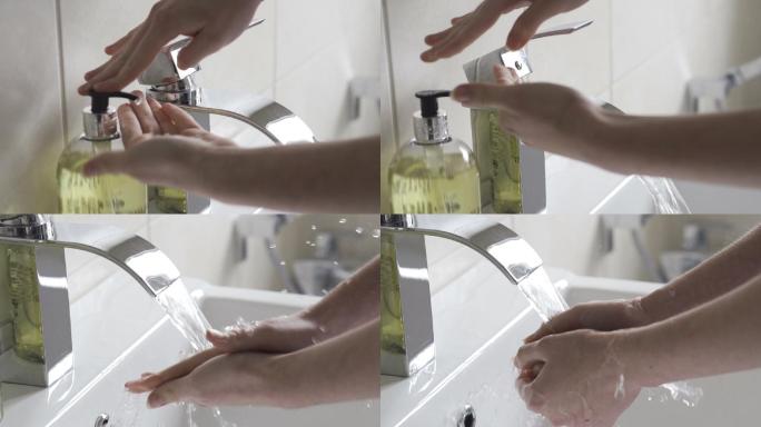 在浴室的洗手盆里用洗手液和大量的水洗手。