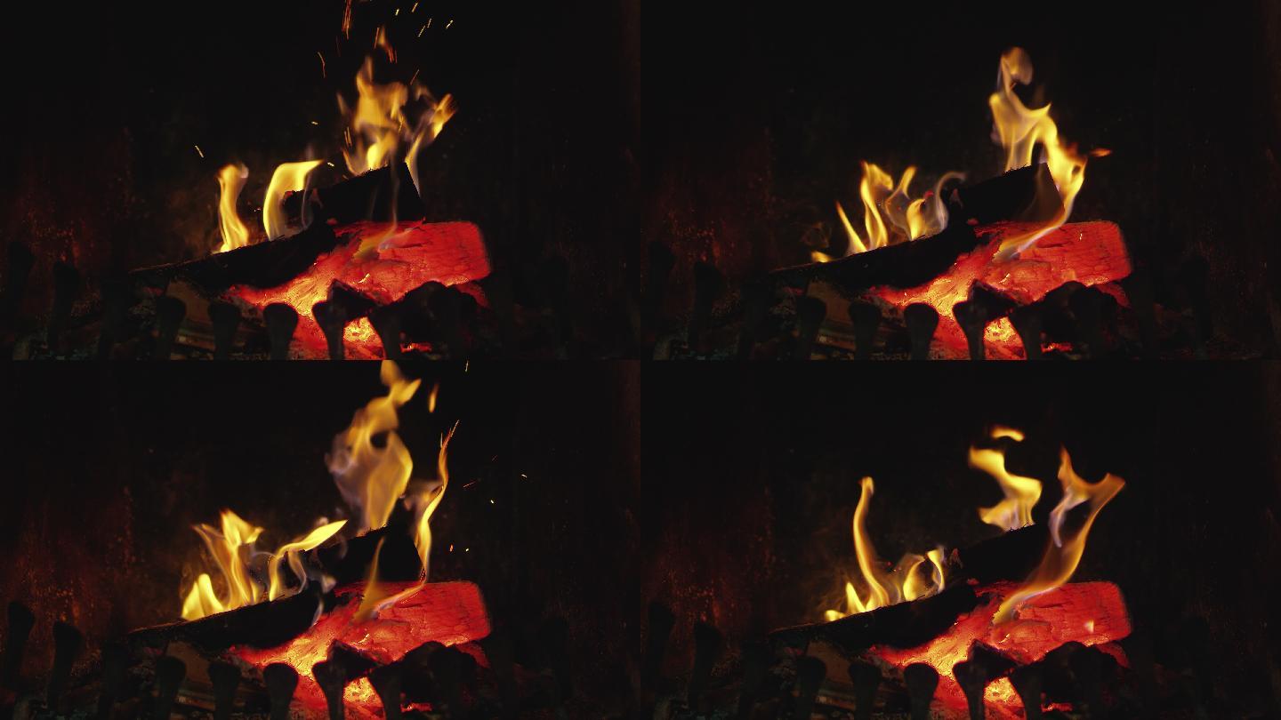 在壁炉里燃烧木头的慢镜头。