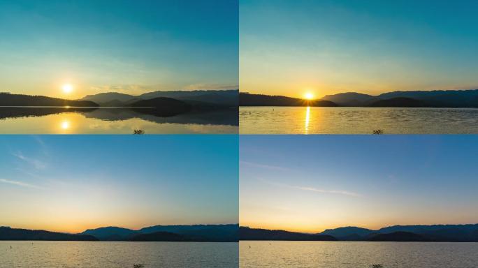 美丽的夕阳掠过山峦和湖泊，日复一日的夕阳时间流逝