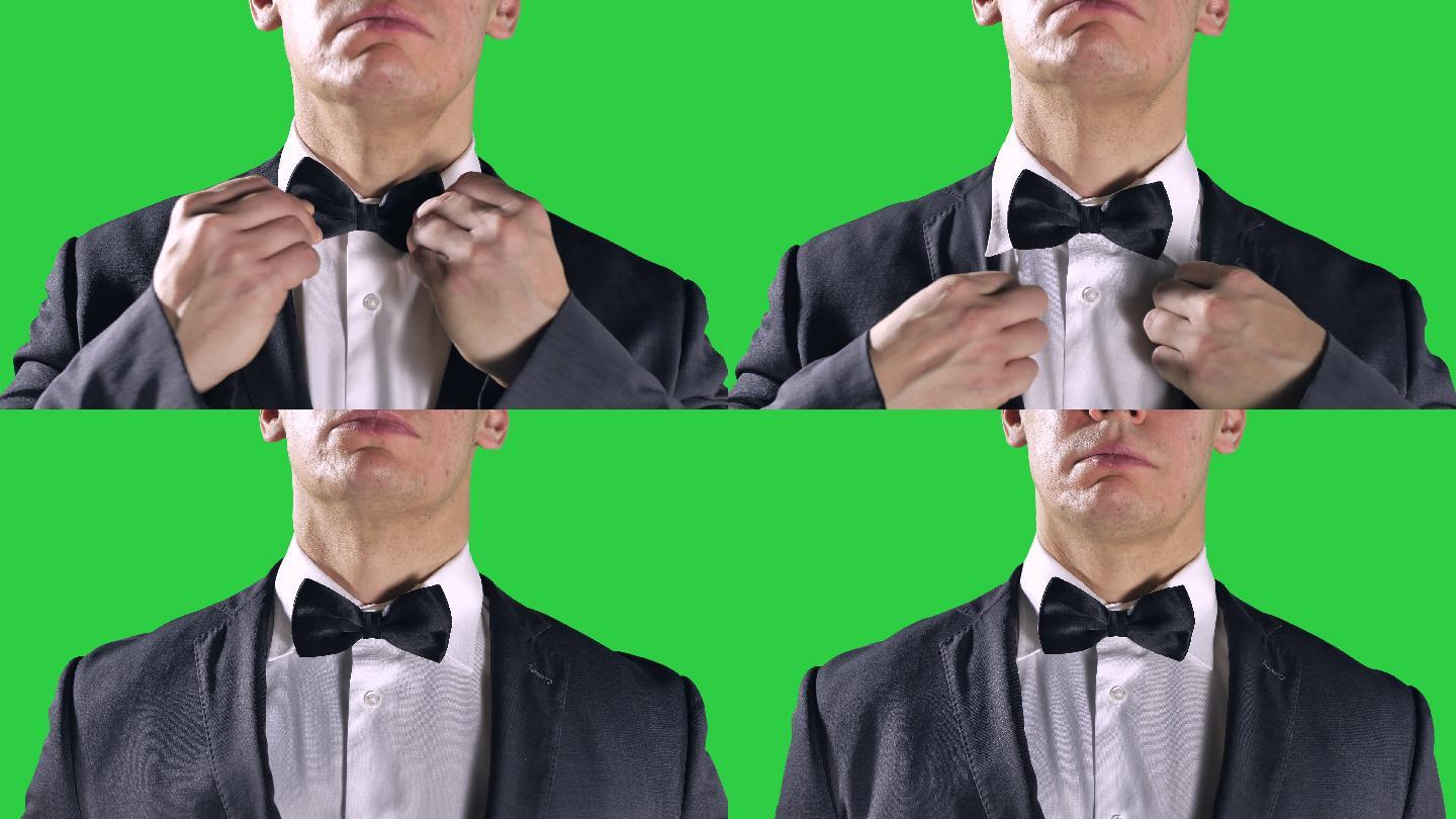男士晚礼服，黑色领结，绿色屏幕背景
